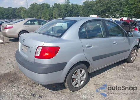2009 Kia Rio Lx z USA, uszkodzony, nr VIN KNADE223296459124